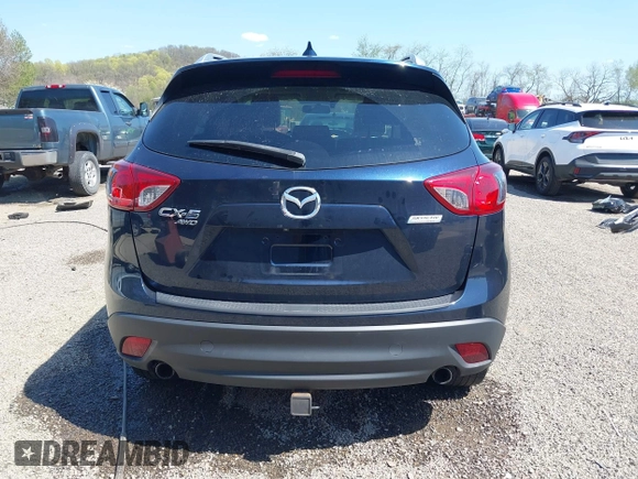 2016 Mazda CX-5 Grand Touring with VIN JM3KE4DY5G0681369, listed as a IAAI auction lot 42102805 with 128,182 mi miles and . Bid and sale history available at DreamBid. Image 16.