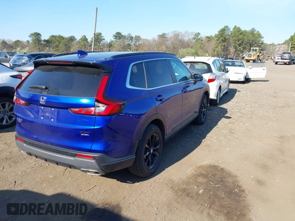 2023 Honda CR-V Sport Touring with VIN 5J6RS6H96PL001826, listed as a IAAI auction lot 42098381 with 13,813 mi miles and . Bid and sale history available at DreamBid. Image 4.