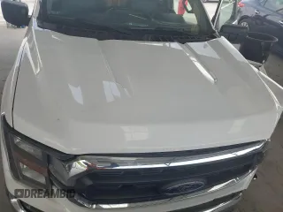 2023 Ford F-150 XL z VIN 1FTEW1C8XPKD33994, wystawiony jako Copart lot #63326315 z przebiegiem 55 593 mil mil oraz Szkoda całkowita • Salvage title. Historia ofert i sprzedaży dostępna na DreamBid. Obrazek 11.