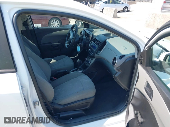 2016 Chevrolet Sonic LS with VIN 1G1JA6SH1G4112485, listed as a IAAI auction lot 40074350 with 139,496 mi miles and . Bid and sale history available at DreamBid. Image 5.