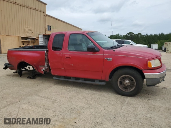 2002 Ford F-150 XL with VIN 2FTRX08L02CA02800, listed as a Copart auction lot 56494315 with 350,842 mi miles and Salvage title. Bid and sale history available at DreamBid. Image 4.