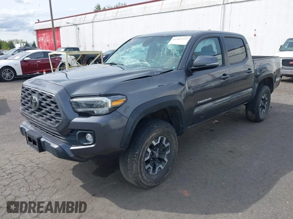 2020 Toyota Tacoma SR5 with VIN 3TMCZ5AN7LM321061, listed as a IAAI auction lot 41985533 with 32,111 mi miles and . Bid and sale history available at DreamBid. Image 18.