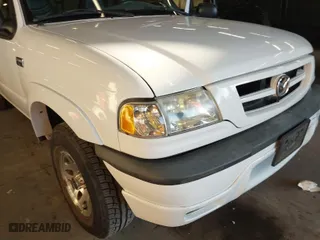 2002 Mazda B-Series 2WD Truck DS with VIN 4F4YR16V42TM25828, listed as a IAAI auction lot 41440414 with 132,334 mi miles. Bid and sale history available at carsss.com. Image 15.