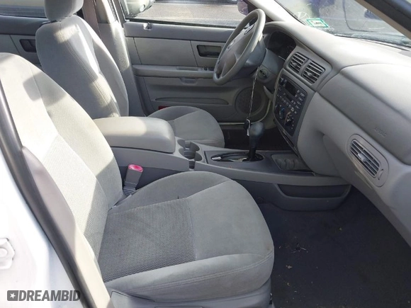 2003 Ford Taurus SE Standard with VIN 1FAFP53U13G210075, listed as a IAAI auction lot 41863786 with 64,943 mi miles. Bid and sale history available at carsss.com. Image 5.