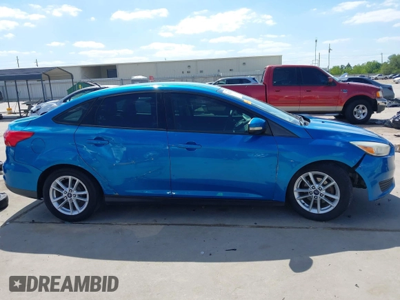 2015 Ford Focus SE with VIN 1FADP3F21FL379837, listed as a IAAI auction lot 42021623 with 146,571 mi miles. Bid and sale history available at carsss.com. Image 13.