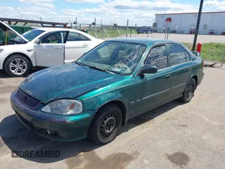 1999 Honda Civic LX z VIN 1HGEJ6672XL044666, wystawiony jako IAAI lot #42343700 z przebiegiem 144 445 mil mil oraz . Historia ofert i sprzedaży dostępna na DreamBid. Obrazek 2.