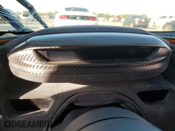 2018 McLaren 720S z VIN SBM14DCA3JW001315, wystawiony jako Copart lot #78193064 z przebiegiem Nie podano mil oraz Szkody całkowita. Historia ofert i sprzedaży dostępna na DreamBid. Obrazek 9.