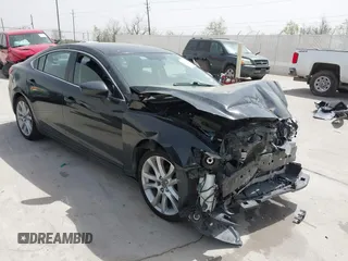 2015 Mazda 6 i Touring with VIN JM1GJ1V67F1174536, listed as a IAAI auction lot 41823441 with 100,264 mi miles. Bid and sale history available at carsss.com. Image 1.
