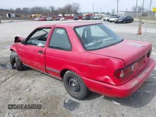 1993 Nissan Sentra z VIN 1N4EB32H7PC770697, wystawiony jako IAAI lot #41727754 z przebiegiem 210 152 mil mil oraz . Historia ofert i sprzedaży dostępna na DreamBid. Obrazek 3.