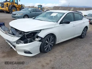 2020 Nissan Altima SR z VIN 1N4BL4CVXLC214582, wystawiony jako IAAI lot #40665527 z przebiegiem 90 224 mil mil oraz . Historia ofert i sprzedaży dostępna na DreamBid. Obrazek 2.