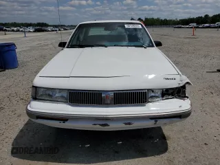 1995 Oldsmobile Cutlass Ciera with VIN 1G3AJ5545S6325270, listed as a Copart auction lot 50148265 with 81,883 mi miles and Salvage Title. Bid and sale history available at DreamBid. Image 5.