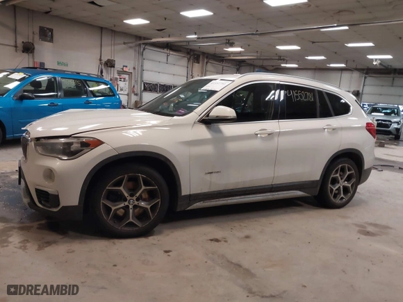 2016 BMW X1 xDrive28i with VIN WBXHT3C30G5E52065, listed as a IAAI auction lot 41552781 with 205,961 mi miles. Bid and sale history available at carsss.com. Image 13.