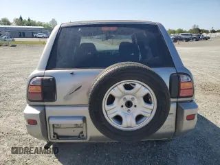 1999 Toyota RAV4 with VIN JT3GP10V5X7053634, listed as a Copart auction lot 52761695 with 236,443 mi miles and Salvage title. Bid and sale history available at DreamBid. Image 6.