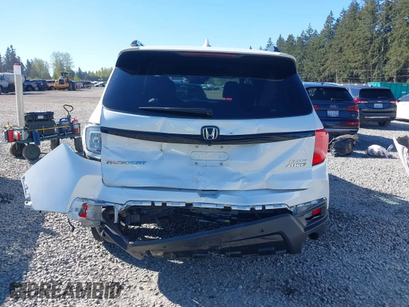 2023 Honda Passport Elite with VIN 5FNYF8H01PB004087, listed as a IAAI auction lot 42045433 with 20,677 mi miles and . Bid and sale history available at DreamBid. Image 6.