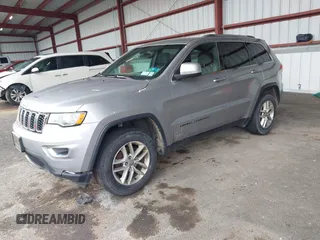 2018 Jeep Grand Cherokee Laredo E with VIN 1C4RJFAG7JC130313, listed as a IAAI auction lot 41969759 with 177,017 mi miles and . Bid and sale history available at DreamBid. Image 2.