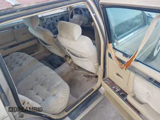 1991 Chrysler New Yorker z VIN 1C3XY66R1MD290736, wystawiony jako IAAI lot #41932377 z przebiegiem 176 868 mil mil oraz . Historia ofert i sprzedaży dostępna na DreamBid. Obrazek 8.