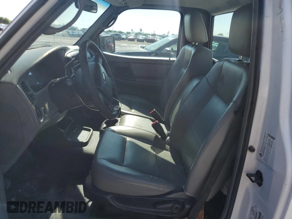 2010 Ford Ranger XL with VIN 1FTKR1AD9APA75973, listed as a Copart auction lot 56220795 with 98,648 mi miles and Salvage title. Bid and sale history available at DreamBid. Image 7.