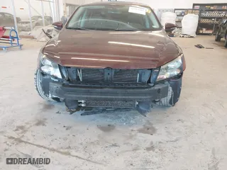 2012 Volkswagen Passat SE with VIN 1VWBH7A31CC015450, listed as a IAAI auction lot 41763605 with 160,288 mi miles. Bid and sale history available at carsss.com. Image 6.