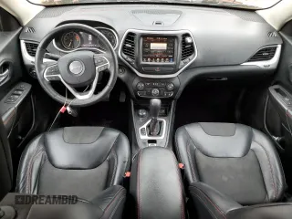 2016 Jeep Cherokee Trailhawk with VIN 1C4PJMBS2GW255368, listed as a Copart auction lot 59010305 with 105,667 mi miles and Salvage title. Bid and sale history available at DreamBid. Image 8.