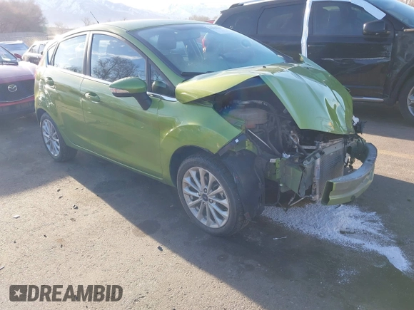 2018 Ford Fiesta Titanium z VIN 3FADP4FJ2JM142861, wystawiony jako IAAI lot #41860660 z przebiegiem 20 820 mil mil oraz . Historia ofert i sprzedaży dostępna na DreamBid. Obrazek 1.