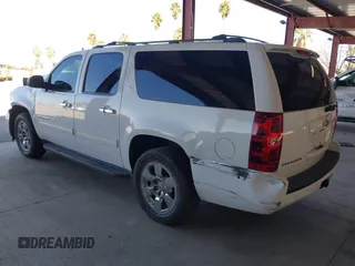 2014 Chevrolet Suburban LT with VIN 1GNSCJE04ER230536, listed as a IAAI auction lot 41666737 with 152,812 mi miles. Bid and sale history available at carsss.com. Image 3.