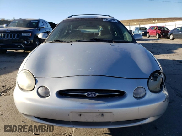 1999 Ford Taurus SE with VIN 1FAFP58U5XG240517, listed as a Copart auction lot 83514044 with 101,092 mi miles and Clean title. Bid and sale history available at DreamBid. Image 5.