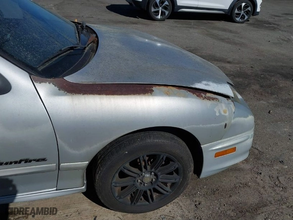 2000 Pontiac Sunfire SE with VIN 1G2JB5246Y7126527, listed as a IAAI auction lot 41613081 with 175,709 mi miles. Bid and sale history available at carsss.com. Image 6.
