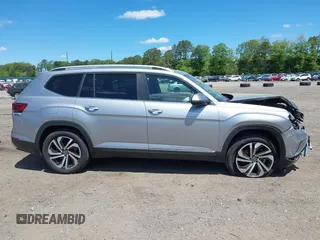 2023 Volkswagen Atlas SEL z VIN 1V2BR2CA2PC510744, wystawiony jako IAAI lot #42292142 z przebiegiem 20 612 mil mil oraz . Historia ofert i sprzedaży dostępna na DreamBid. Obrazek 13.