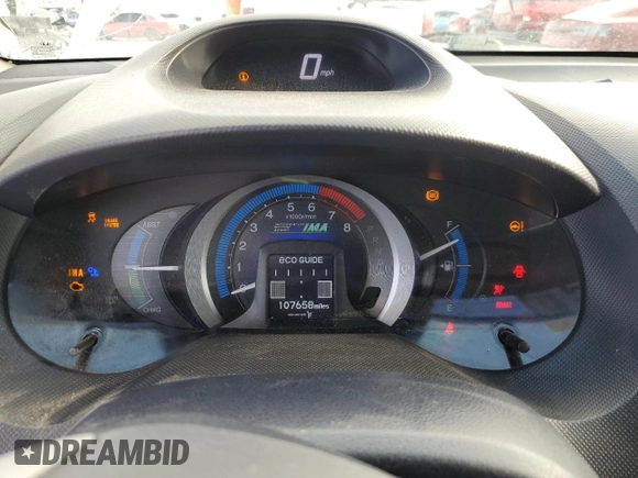 2010 Honda Insight EX z VIN JHMZE2H75AS007066, wystawiony jako Copart lot #54910995 z przebiegiem 107 658 mil mil oraz Szkoda całkowita • Salvage title. Historia ofert i sprzedaży dostępna na DreamBid. Obrazek 9.