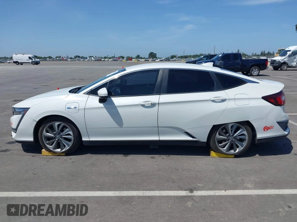2018 Honda Clarity z VIN JHMZC5F10JC015706, wystawiony jako IAAI lot #42290573 z przebiegiem 158 987 mil mil oraz . Historia ofert i sprzedaży dostępna na DreamBid. Obrazek 14.