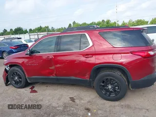 2020 Chevrolet Traverse LT Cloth with VIN 1GNERGKW1LJ220257, listed as a IAAI auction lot 42290561 with 95,801 mi miles and . Bid and sale history available at DreamBid. Image 14.
