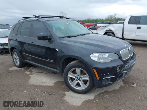 2012 BMW X5 35d z VIN 5UXZW0C55CL674191, wystawiony jako IAAI lot #41906713 z przebiegiem 143 687 mil mil oraz . Historia ofert i sprzedaży dostępna na DreamBid. Obrazek 1.