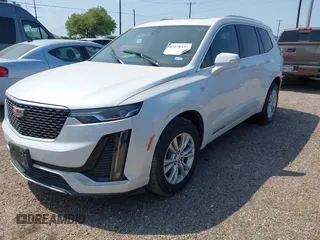 2023 Cadillac XT6 FWD Luxury z VIN 1GYKPAR4XPZ182533, wystawiony jako IAAI lot #42078937 z przebiegiem 31 248 mil mil oraz . Historia ofert i sprzedaży dostępna na DreamBid. Obrazek 2.