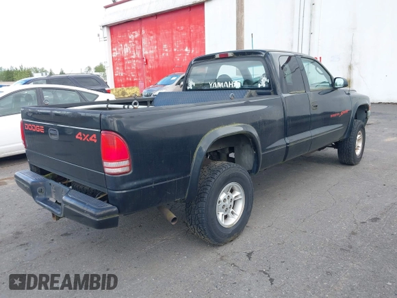 1999 Dodge Dakota SLT with VIN 1B7GG22YXXS229633, listed as a IAAI auction lot 42088939 with 148,049 mi miles and . Bid and sale history available at carsss.com. Image 4.