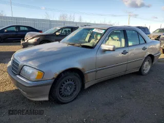 1998 Mercedes-Benz C 230/260/280/320 with VIN WDBHA23G0WF720567, listed as a Copart auction lot 78736034 with 255,172 mi miles and Salvage Title. Bid and sale history available at carsss.com. Image 1.