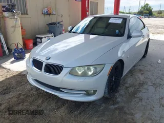 2011 BMW 3 Series 328i with VIN WBAKE3C53BE557457, listed as a IAAI auction lot 41631581 with 112,272 mi miles and . Bid and sale history available at carsss.com. Image 2.