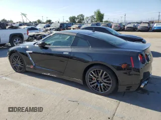2016 Nissan GT-R Premium z VIN JN1AR5EF8GM290918, wystawiony jako Copart lot #58314455 z przebiegiem 23 667 mil mil oraz Szkody całkowita. Historia ofert i sprzedaży dostępna na DreamBid. Obrazek 2.