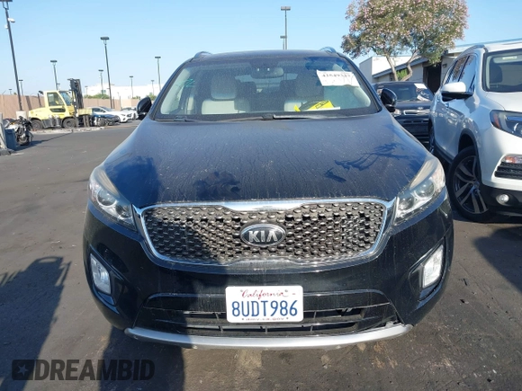 2016 Kia Sorento SXL z VIN 5XYPK4A50GG115809, wystawiony jako IAAI lot #42549327 z przebiegiem 102 958 mil mil oraz . Historia ofert i sprzedaży dostępna na DreamBid. Obrazek 12.