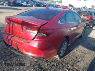 2018 Hyundai Sonata Sport with VIN 5NPE34AF2JH596644, listed as a IAAI auction lot 41986683 with 129,106 mi miles and . Bid and sale history available at carsss.com. Image 4.