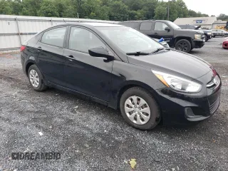 2015 Hyundai Accent GLS with VIN KMHCT4AE8FU927153, listed as a Copart auction lot 61056473 with 117,105 mi miles. Bid and sale history available at carsss.com. Image 4.