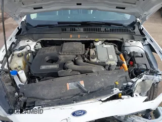 2020 Ford Fusion Hybrid SE with VIN 3FA6P0LU5LR195611, listed as a IAAI auction lot 41807998 with 128,439 mi miles. Bid and sale history available at carsss.com. Image 10.