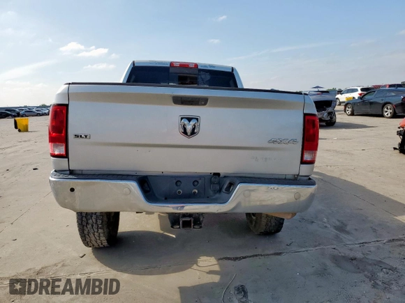 2014 Ram 2500 SLT with VIN 3C6TR5DT2EG205852, listed as a Copart auction lot 59514745 with 130,510 mi miles and Salvage title. Bid and sale history available at DreamBid. Image 6.