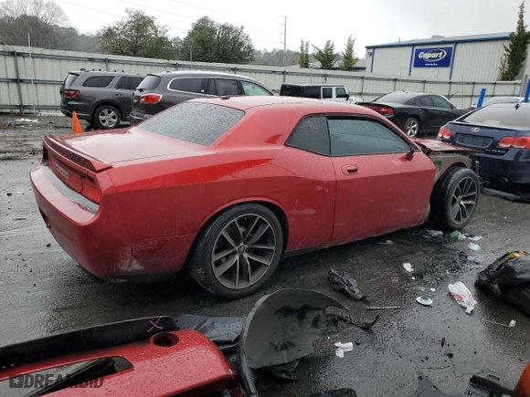 2010 Dodge Challenger R/T with VIN 2B3CJ5DTXAH265454, listed as a Copart auction lot 44621625 with 121,745 mi miles and Salvage Title. Bid and sale history available at carsss.com. Image 3.