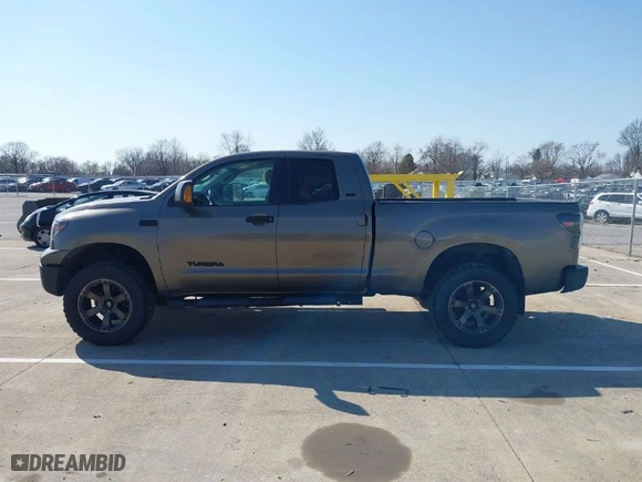 2010 Toyota Tundra 4WD Truck with VIN 5TFUY5F14AX140360, listed as a IAAI auction lot 41790725 with 160,447 mi miles. Bid and sale history available at carsss.com. Image 14.