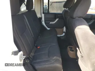 2015 Jeep Wrangler Unlimited Sahara with VIN 1C4BJWEG2FL561032, listed as a Copart auction lot 48885885 with 92,073 mi miles and Salvage Title. Bid and sale history available at carsss.com. Image 10.