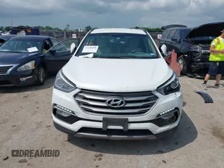 2018 Hyundai Santa Fe 2.4L z VIN 5NMZUDLB3JH055771, wystawiony jako IAAI lot #42126058 z przebiegiem 142 991 mil mil oraz . Historia ofert i sprzedaży dostępna na DreamBid. Obrazek 12.