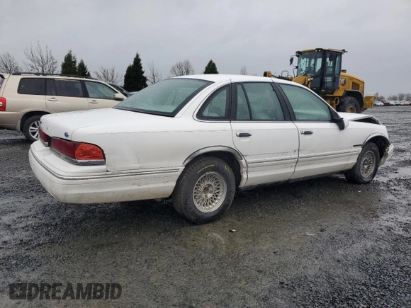 1995 Ford Crown Victoria LX с VIN 2FALP74W1SX200511, выставлен на аукционе Copart как лот 48807055 с пробегом 62 133 миль миль и Списание • Salvage title. История ставок и продаж доступна на DreamBid. Изображение 3.