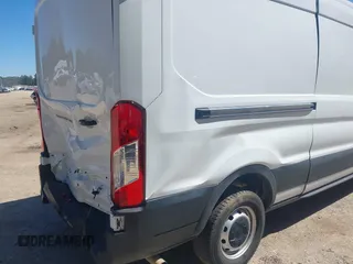 2022 Ford Transit Cargo with VIN 1FTBR1C84NKA76483, listed as a IAAI auction lot 40365786 with 28,854 mi miles and . Bid and sale history available at DreamBid. Image 18.