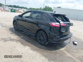 2022 Ford Edge SE z VIN 2FMPK4G91NBA59211, wystawiony jako IAAI lot #42450362 z przebiegiem 50 016 mil mil oraz . Historia ofert i sprzedaży dostępna na DreamBid. Obrazek 3.