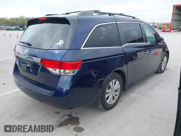 2014 Honda Odyssey EX-L with VIN 5FNRL5H68EB049914, listed as a IAAI auction lot 41986894 with 125,222 mi miles and . Bid and sale history available at carsss.com. Image 4.